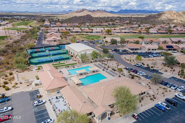 drone / aerial view featuring a mountain view and a residential view