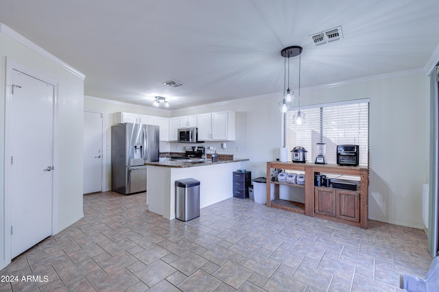 10856 E Arcadia Ave, Mesa, AZ 85208 - kitchen featuring stainless steel appliances, dark countertops, a peninsula, white cabinetry, and crown molding