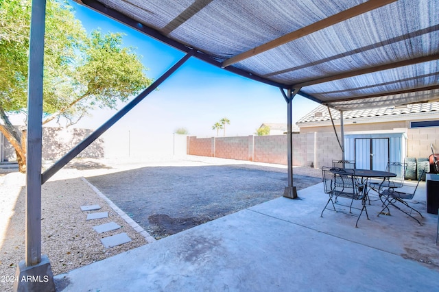 10856 E Arcadia Ave, Mesa, AZ 85208 - fenced backyard with a patio area and outdoor dining area