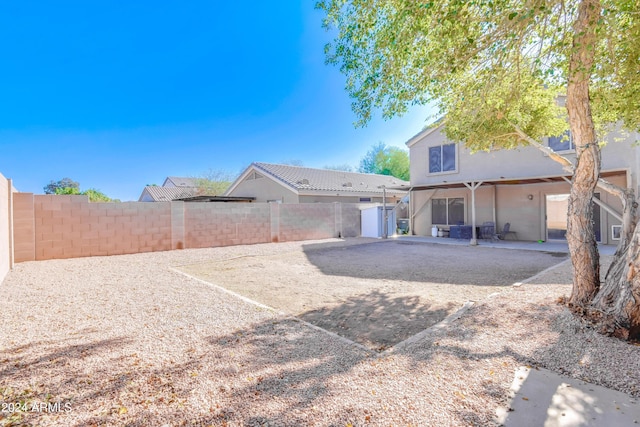 10856 E Arcadia Ave, Mesa, AZ 85208 - rear view of house with a patio area, a fenced backyard, and stucco siding