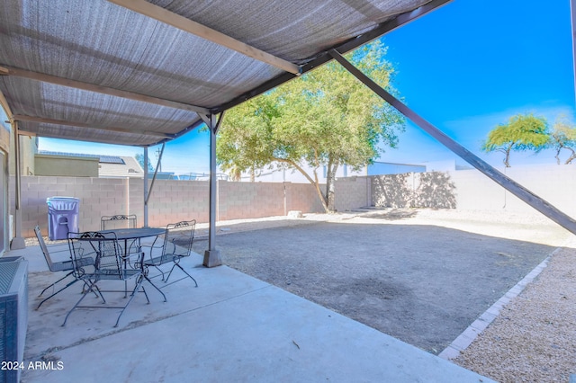 10856 E Arcadia Ave, Mesa, AZ 85208 - fenced backyard with a patio and outdoor dining area
