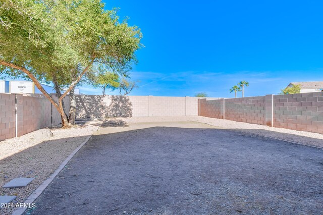 10856 E Arcadia Ave, Mesa, AZ 85208 - fenced backyard featuring a patio