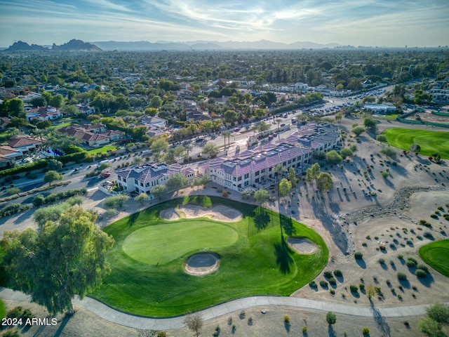 birds eye view of property featuring a mountain view