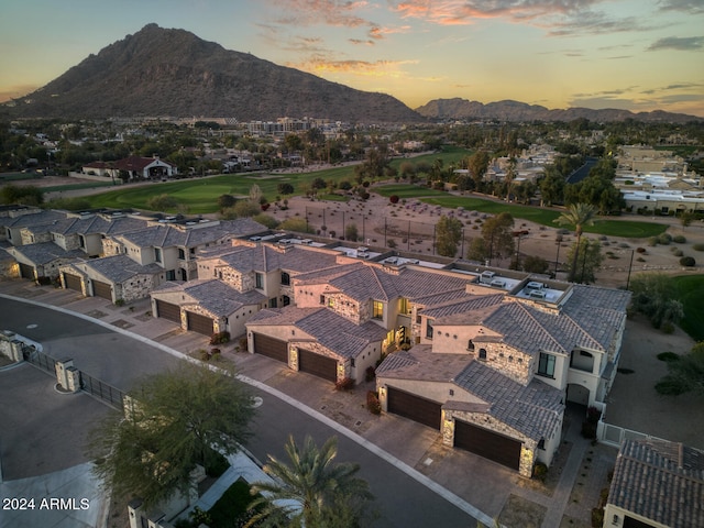 aerial view at dusk with a mountain view