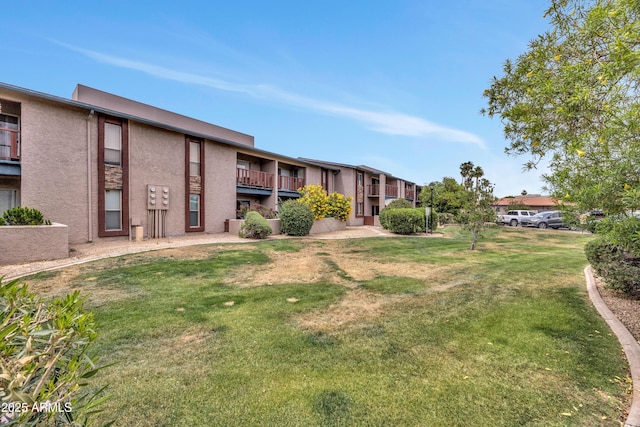 surrounding community with a yard