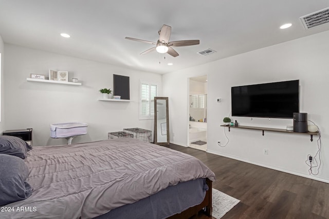 bedroom with ceiling fan, dark hardwood / wood-style flooring, and ensuite bath