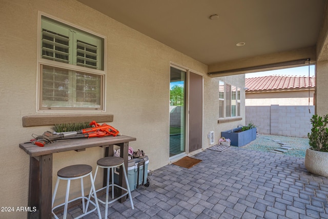 view of patio featuring exterior bar