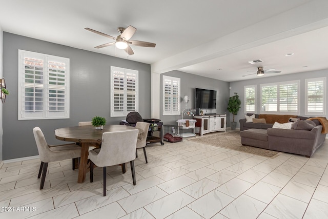 dining space with ceiling fan