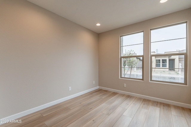 empty room with light wood-type flooring