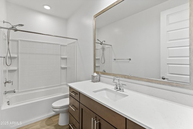 full bathroom with recessed lighting, shower / bath combination, toilet, vanity, and wood finished floors