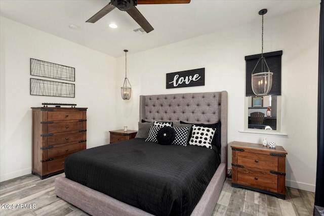20428 W Elm Dr, Buckeye, AZ 85396 - bedroom featuring wood finished floors, baseboards, and ceiling fan