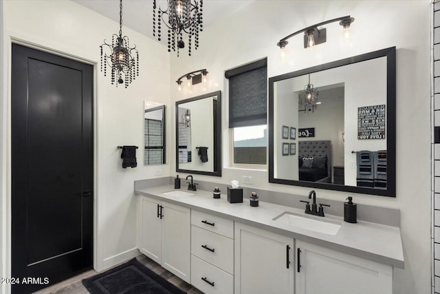 bathroom featuring vanity and hardwood / wood-style flooring