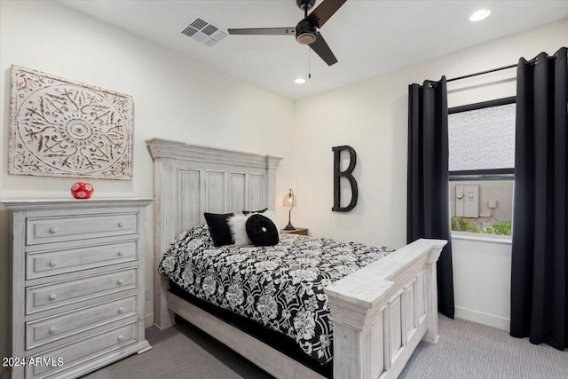 carpeted bedroom with ceiling fan