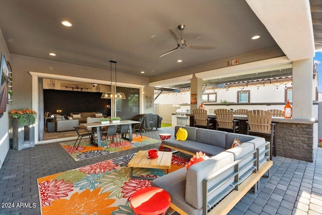 20428 W Elm Dr, Buckeye, AZ 85396 - view of patio / terrace featuring outdoor lounge area, outdoor dining area, and a ceiling fan