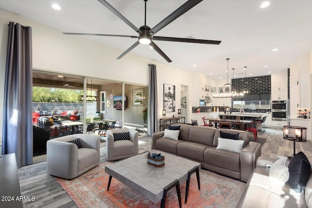 20428 W Elm Dr, Buckeye, AZ 85396 - living area with a ceiling fan, recessed lighting, and light wood-style flooring