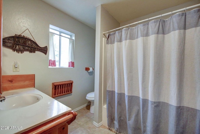 full bath with curtained shower, vanity, toilet, and tile patterned floors