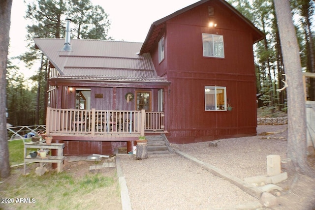 rustic home with crawl space and metal roof