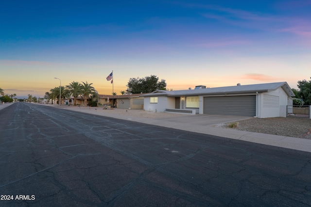 view of front of property featuring a garage