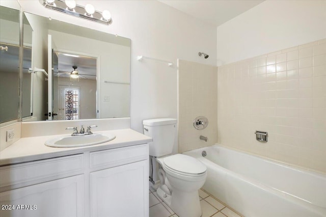 full bathroom with ceiling fan, vanity, tiled shower / bath combo, tile patterned flooring, and toilet