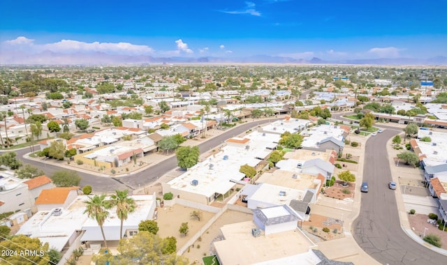 drone / aerial view featuring a mountain view