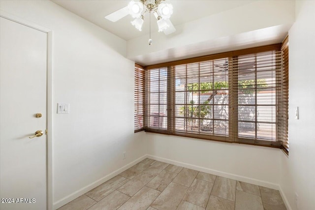 empty room featuring ceiling fan