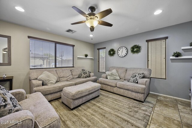 tiled living area featuring recessed lighting, visible vents, baseboards, and ceiling fan
