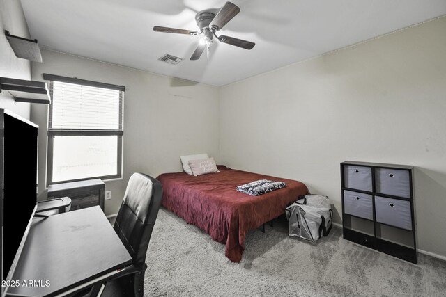 bedroom with a ceiling fan, carpet, visible vents, and baseboards