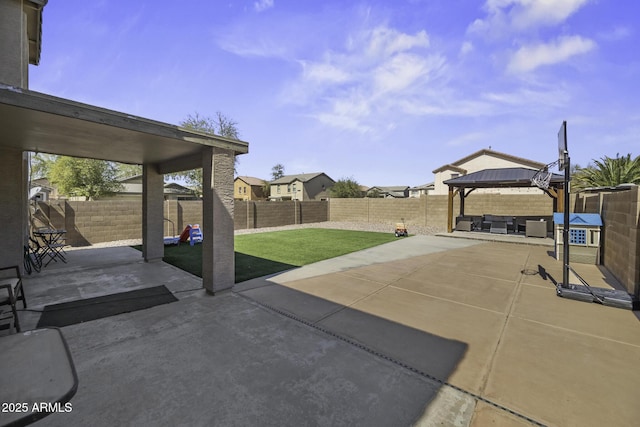 view of patio / terrace with a gazebo and a fenced backyard