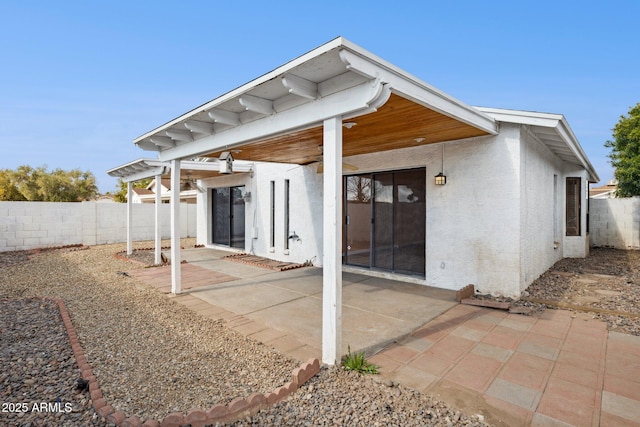 rear view of property with a patio area