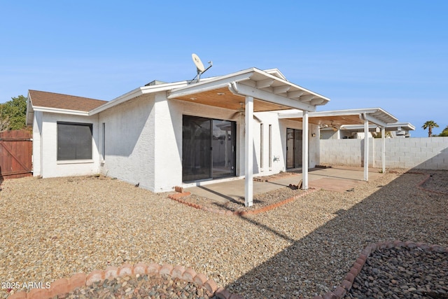 rear view of property with a patio area