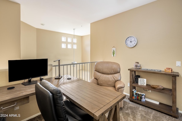 office featuring baseboards and carpet flooring