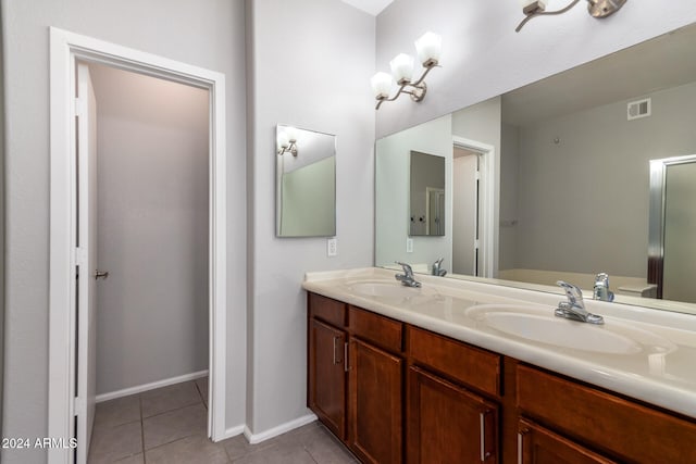 bathroom featuring vanity and tile patterned floors