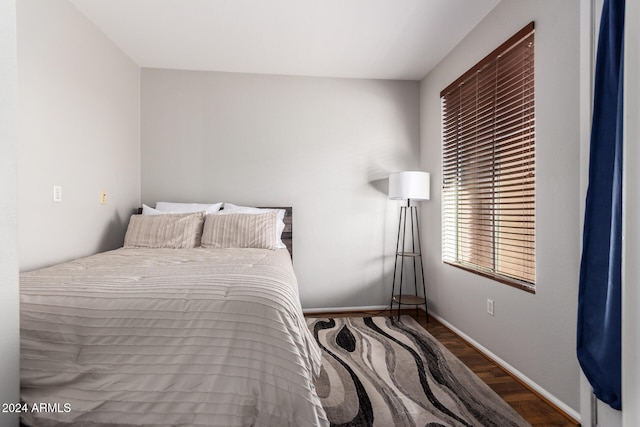 bedroom featuring hardwood / wood-style flooring