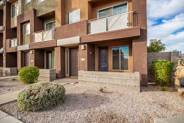 property entrance with a balcony