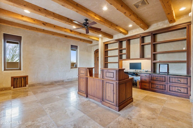 office space with visible vents, ceiling fan, beamed ceiling, built in desk, and recessed lighting