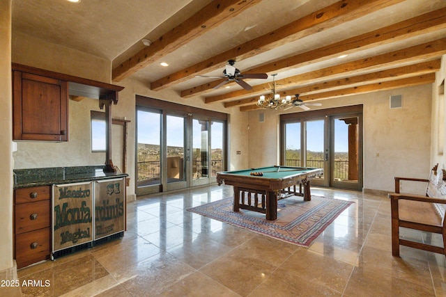 playroom featuring french doors, a healthy amount of sunlight, beamed ceiling, and visible vents