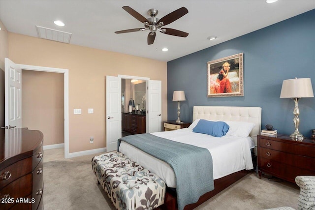 bedroom with light colored carpet and ceiling fan