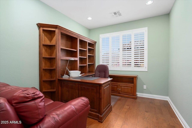 office area featuring hardwood / wood-style floors