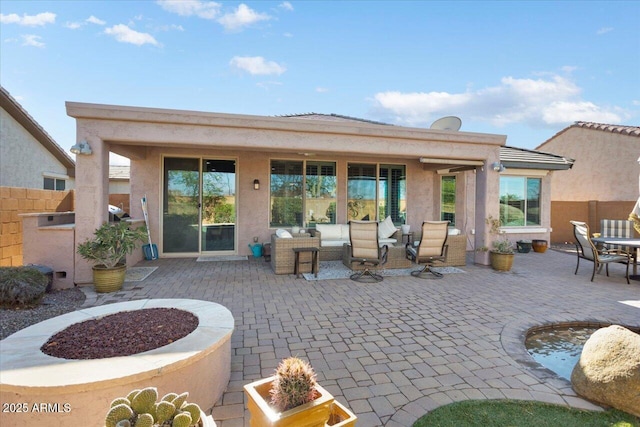 rear view of property with a patio