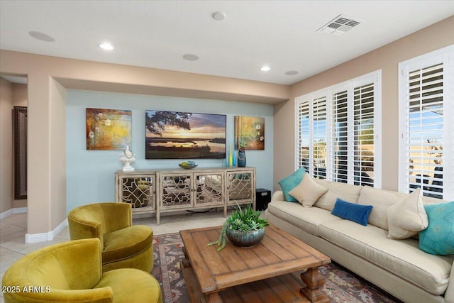 living room with light tile patterned floors