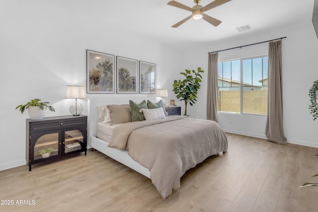 22634 E Roundup Way, Queen Creek, AZ 85142 - bedroom with light wood-type flooring and a ceiling fan