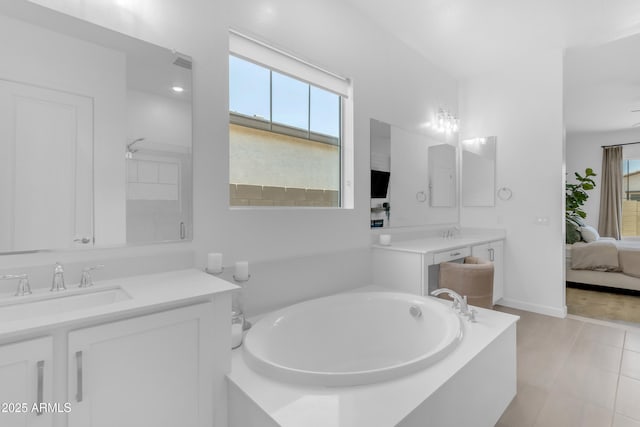 22634 E Roundup Way, Queen Creek, AZ 85142 - full bathroom with a bath, vanity, ensuite bath, and tile patterned flooring