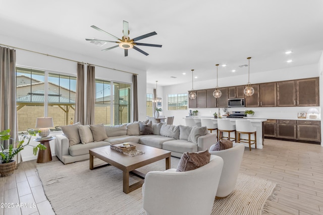 22634 E Roundup Way, Queen Creek, AZ 85142 - living room featuring recessed lighting and ceiling fan