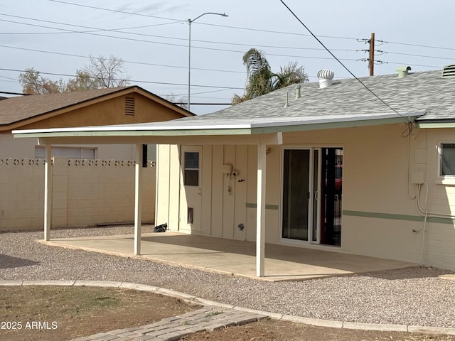 rear view of property with a patio area