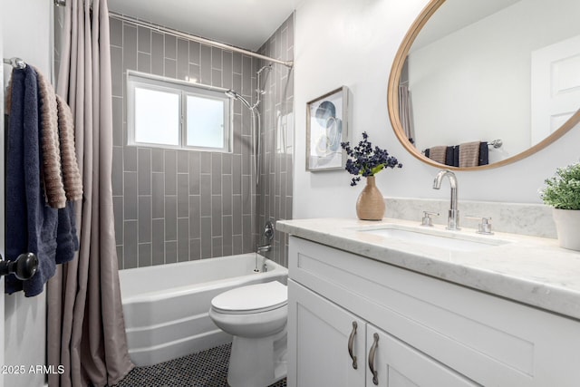 full bath featuring tile patterned floors, toilet, vanity, and shower / tub combo with curtain