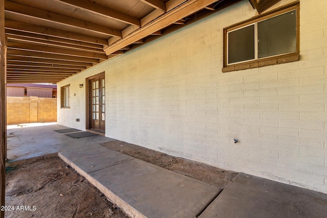 doorway to property with a patio