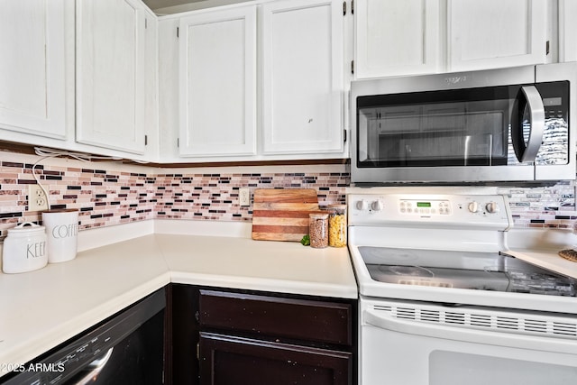 930 N Mesa Dr Unit 1079, Mesa, AZ 85201 - kitchen with white cabinetry, light countertops, white electric stove, and stainless steel microwave