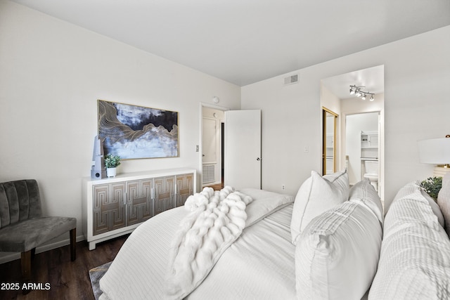 930 N Mesa Dr Unit 1079, Mesa, AZ 85201 - bedroom with ensuite bathroom, visible vents, and wood finished floors