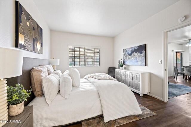930 N Mesa Dr Unit 1079, Mesa, AZ 85201 - bedroom featuring baseboards, multiple windows, and wood finished floors