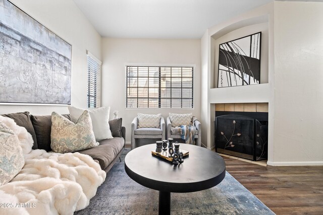 930 N Mesa Dr Unit 1079, Mesa, AZ 85201 - living area featuring a tile fireplace, baseboards, and wood finished floors